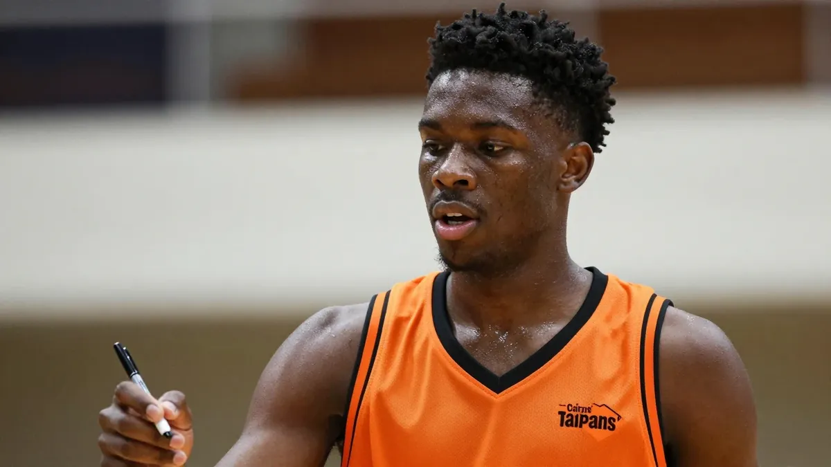 Milwaukee Bucks draft pick Malique Lewis signs two-year deal with Cairns Taipans in Australia, retaining NBA rights